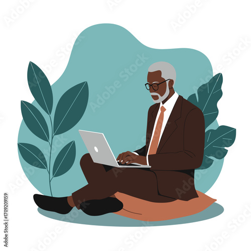 A distinguished senior Black businessman, dressed in a formal suit, diligently works on his laptop while comfortably seated outdoors amidst lush greenery.
