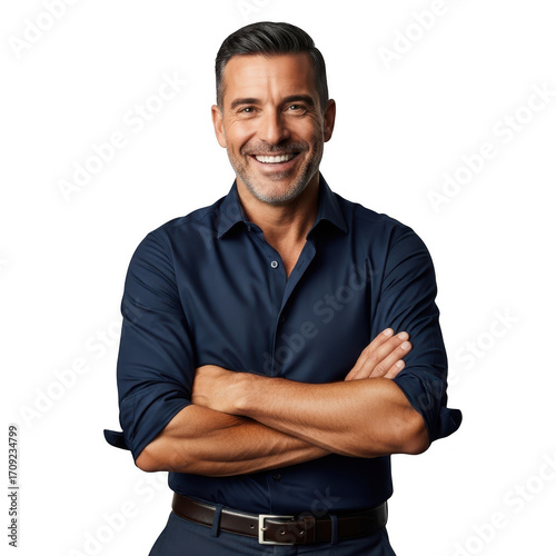 Confident man smiling with arms crossed wearing a dark shirt and belt