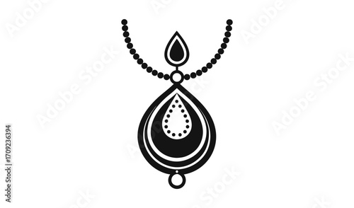 Elegant teardrop pendant necklace with intricate detailing in black and white