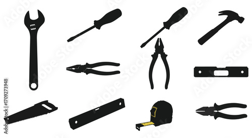 An assortment of common hand tools depicted in black silhouettes