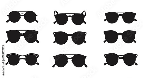 Collection of stylish sunglasses in various shapes and designs flat lay