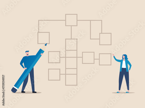 Two business people collaborate to build and design a flowchart or organizational chart together