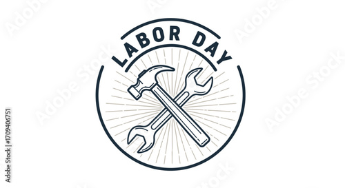 Labor Day graphic design: crossed hammer and wrench in a circular emblem with sunburst rays, against a white background, minimalist style, monochrome color scheme.