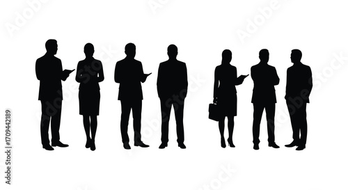 Silhouettes of a group of business people standing in a row