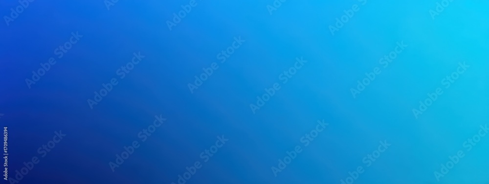 Obraz premium A blue background with a gradient of light blue to dark blue