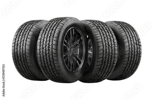 Four New Tires Stacked Together