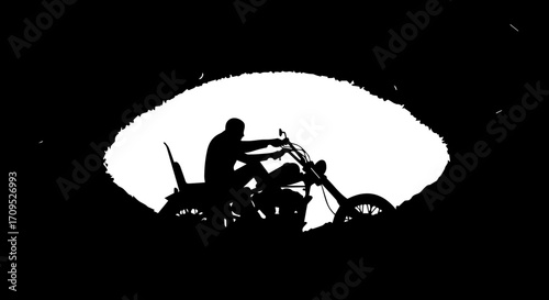 Lone biker silhouetted against bright sky, embracing freedom on a powerful motorcycle adventure.