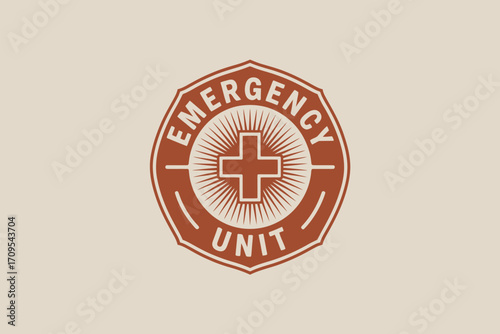 A stylized emergency unit logo featuring a cross and the words emergency unit in a brown color