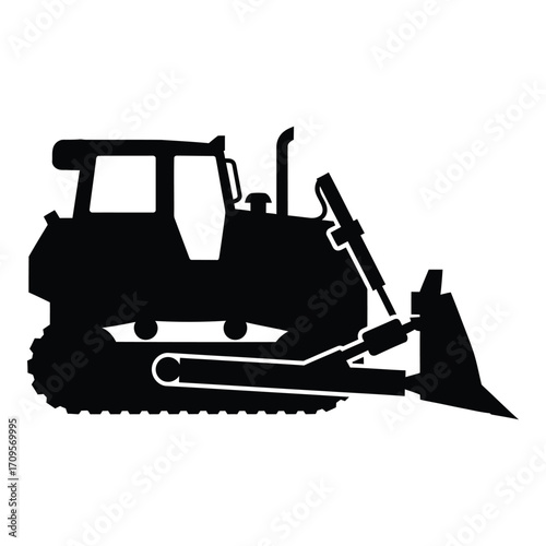 Silhouette of a crawler bulldozer with a front blade in a construction setting silhouette