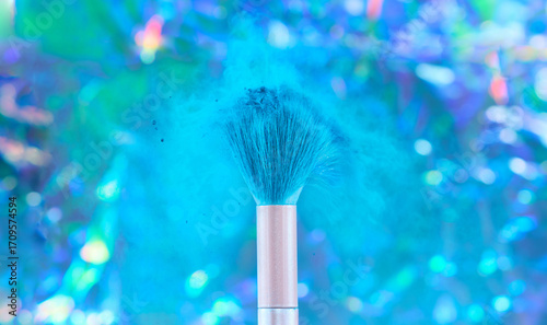 Still Life of Makeup Brush Shedding Blue Powder