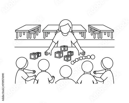 Teacher leading a lesson with children using blocks and balls at a table in a classroom