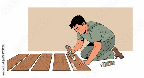 Man performing floor installation, carefully applying adhesive to wooden planks. Professional floor installation process involves precise placement and sealing of timber boards.
