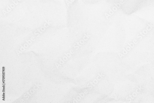 White recycled craft paper texture as background. Grey paper texture, Old vintage page or grunge vignette of old newspaper. Pattern rough art creased grunge letter. Hardboard with copy space for text.