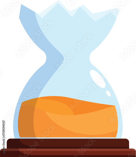 Hourglass with orange sand inside, placed on wooden stand, measuring passing time