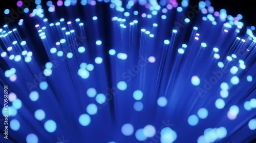 A mesmerizing high-quality 4K abstract of glowing blue fiber optic cables, symbolizing digital data transfer and future network technology