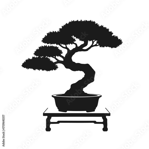 Silhouette of a traditional bonsai tree elegantly displayed on a wooden stand symbolizing nature and tranquility