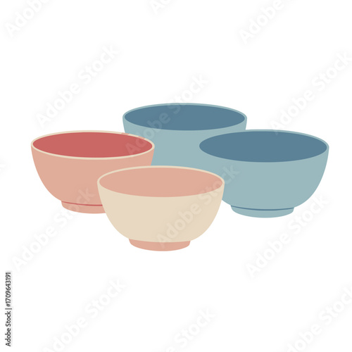 Four colorful ceramic bowls arranged together for food preparation or serving