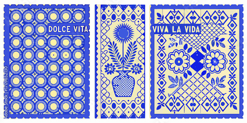 Traditional mexican papel picado banners with floral motifs and text phrases dolce vita and viva la vida