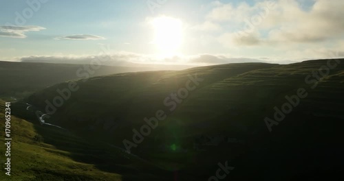 Sunrise over a valley in Yorkshire Dales