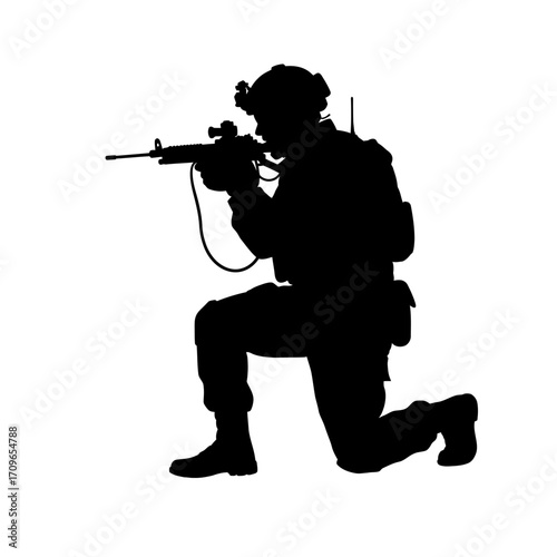 Silhouette of a soldier kneeling aiming a rifle ready for combat action and tactical operations