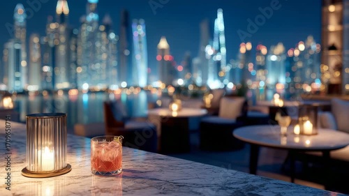 Cocktail on rooftop bar with city lights