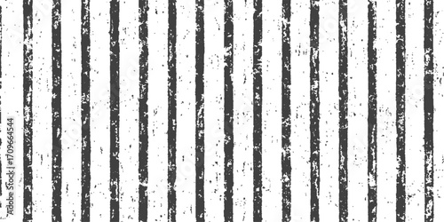 Close-up of a weathered, textured, brown wooden fence with a grunge paint pattern