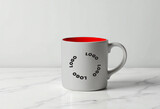 White ceramic mug mockup on marble surface