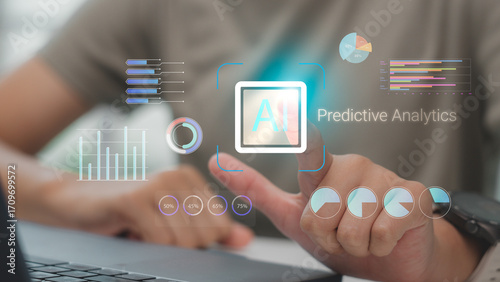 Businessman using AI predictive analytics with futuristic data visualization, graphs, and charts for business intelligence and technology solutions.