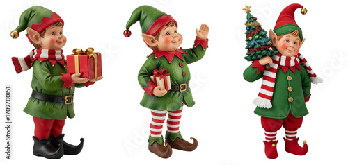 Set of three charming Christmas elf figurines in festive poses with gifts and a tree, isolated on a white background