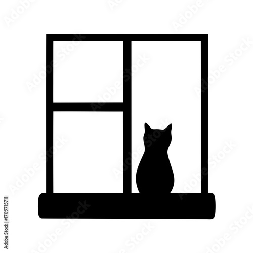 Silhouette of a cat sitting on a window sill staring outwards