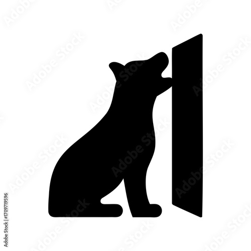 Silhouette of a dog barking at a wall or scratching the wall