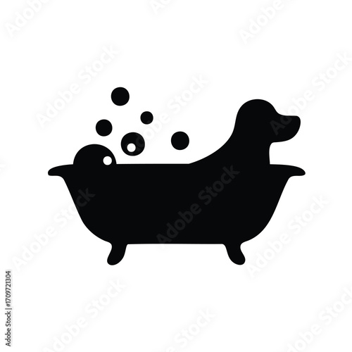 Silhouette of a dog taking a bubble bath in a black tub