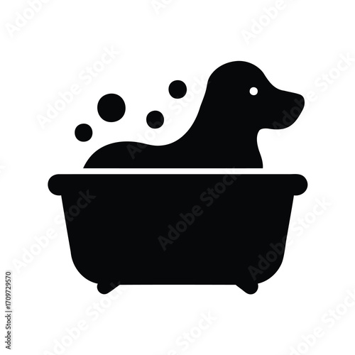 Silhouette of a dog taking a bath in a tub with bubbles