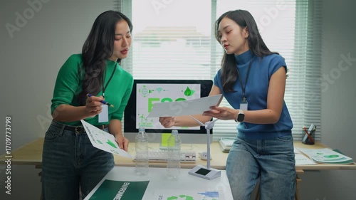 Asian businesswomen discussing environmental, social, and governance - esg -