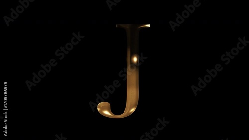 Golden uppercase alphabet reflecting light 