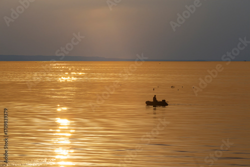 Boat on the Volga River at sunset