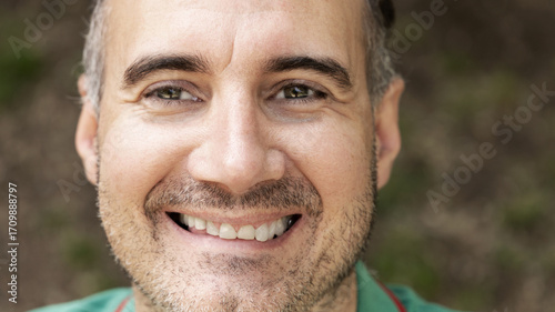 man's natural smile in close-up