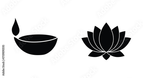 Simple black and white illustration of a diya lamp and lotus flower