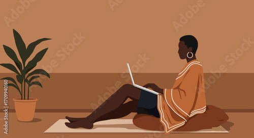 A focused Black woman works remotely on her laptop in a comfortable, minimalist home setting. Represents modern lifestyle, productivity, and digital work.