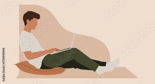 Middle Eastern man in traditional and casual wear, working remotely on a laptop in a modern home environment. Represents comfort, productivity, and contemporary lifestyle.
