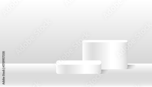 Two white cylindrical containers are placed on smooth surface with gradient background, creating minimalist and modern look