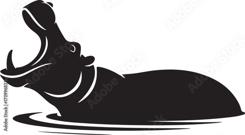 Silhouette of a hippopotamus with its mouth wide open in water