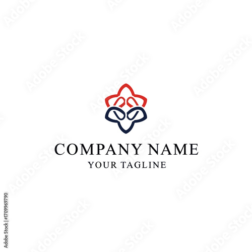 An abstract logo design featuring a symmetrical, stylized floral or geometric shape in red and navy blue on a white background.