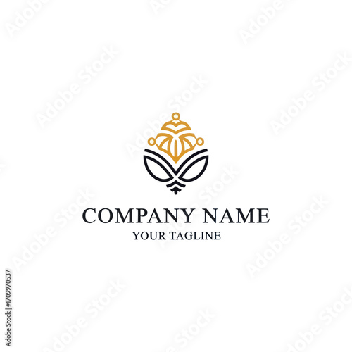 Elegant gold and black logo design featuring a stylized crown and leaf motif on a white background.