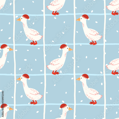 Seamless Christmas vector pattern with geese in Santa hats and falling snow on a light blue striped background. Cute winter design for wrapping paper, textiles, and holiday decor