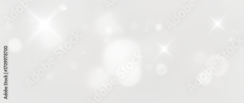 Radiant luxury glow with golden shimmer particles, dazzling glitter dust, vibrant luminous sparkle and elegant shining starlight in abstract festive background for card illustration design.