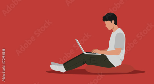 Person sitting comfortably on a cushion, focused on working or studying on a laptop. Represents remote work, online learning, and casual digital lifestyle.