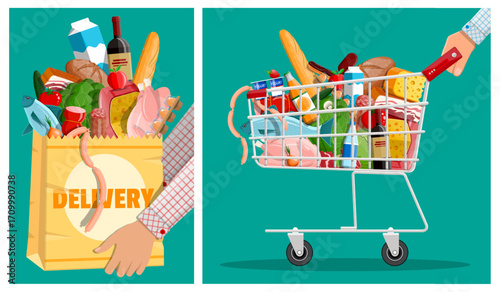 Man delivery groceries with paper bag and hand pushing shopping cart full of food. Supermarket purchase for grocery retail.