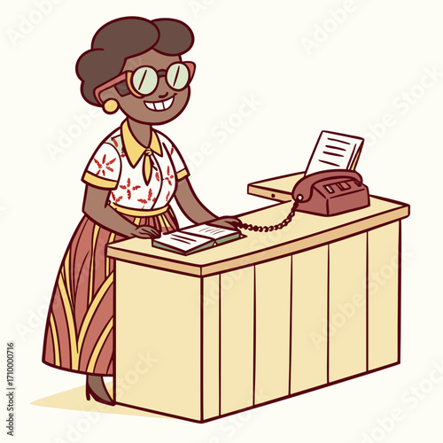 Smiling receptionist, woman in colorful blouse and skirt, natural hair, large glasses, counter with telephone, diary and decorative papers.