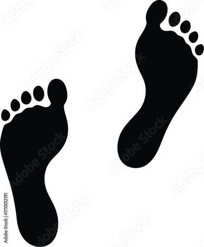 Simple black footprints on a white background, representing a journey or a path forward.